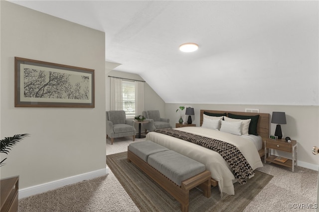 carpeted bedroom with vaulted ceiling and baseboards