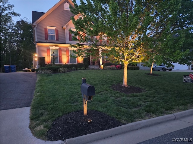 view of front of house with a front lawn