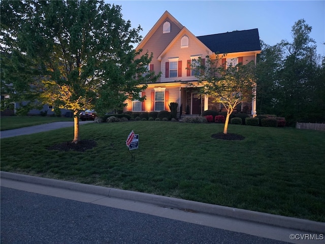view of front facade featuring a front yard