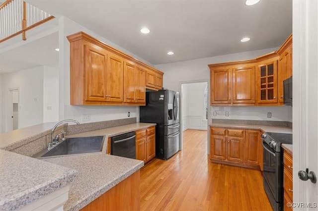 11107 Lyndenwood Dr, Chesterfield, VA 23838 - kitchen with a sink, range with electric cooktop, dishwashing machine, black microwave, and stainless steel refrigerator with ice dispenser