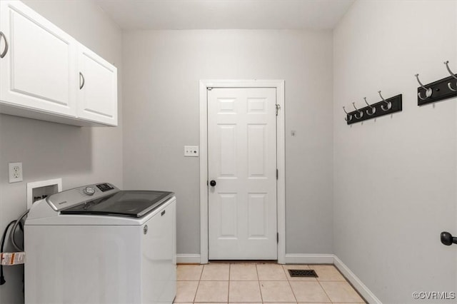 11107 Lyndenwood Dr, Chesterfield, VA 23838 - washroom featuring baseboards, washer / dryer, cabinet space, and light tile patterned floors
