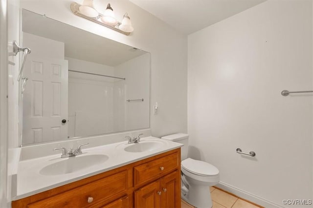 11107 Lyndenwood Dr, Chesterfield, VA 23838 - bathroom featuring toilet, tile patterned floors, a sink, and double vanity