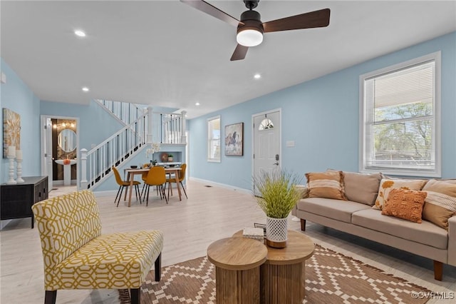 6512 River Rd, South Chesterfield, VA 23803 - living area featuring light wood-style flooring, baseboards, recessed lighting, ceiling fan, and stairway