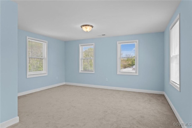 6512 River Rd, South Chesterfield, VA 23803 - carpeted spare room with visible vents and baseboards