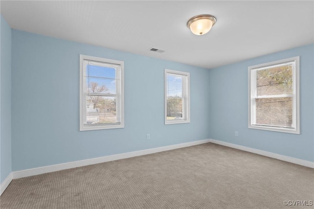 6512 River Rd, South Chesterfield, VA 23803 - carpeted spare room featuring visible vents and baseboards