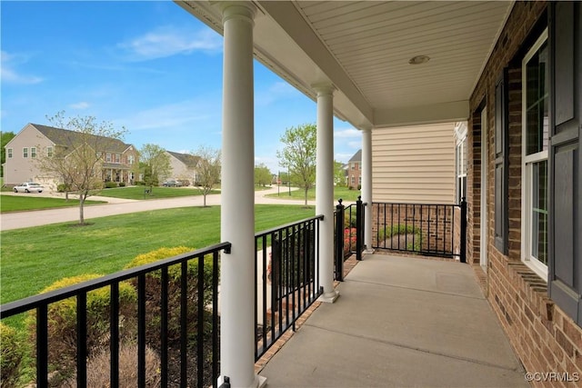 balcony with a porch and a residential view
