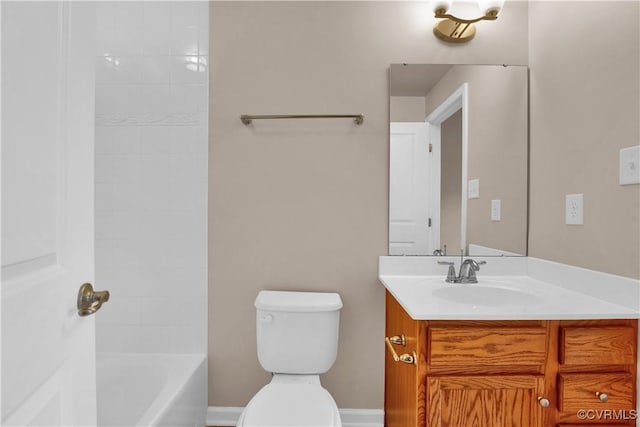 bathroom with vanity, toilet, and shower / bath combination