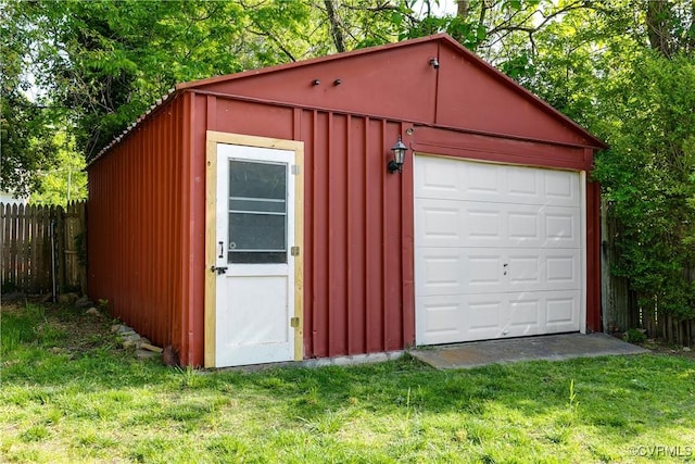 garage with fence