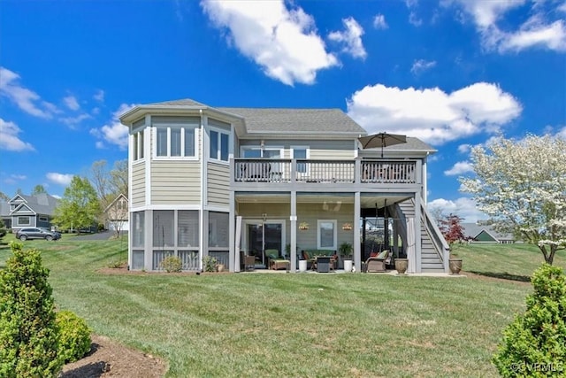 back of house with a wooden deck, stairway, a yard, a patio, and outdoor lounge area