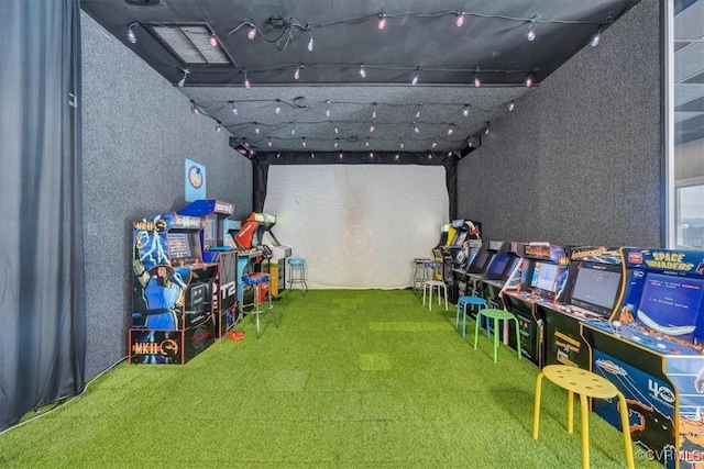 recreation room with carpet flooring