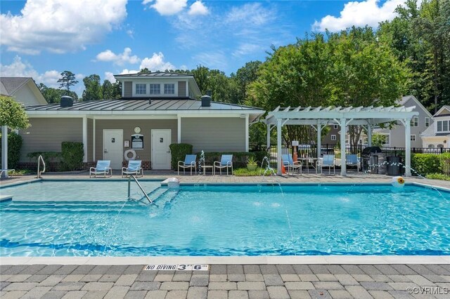 pool with fence, a pergola, and a patio area