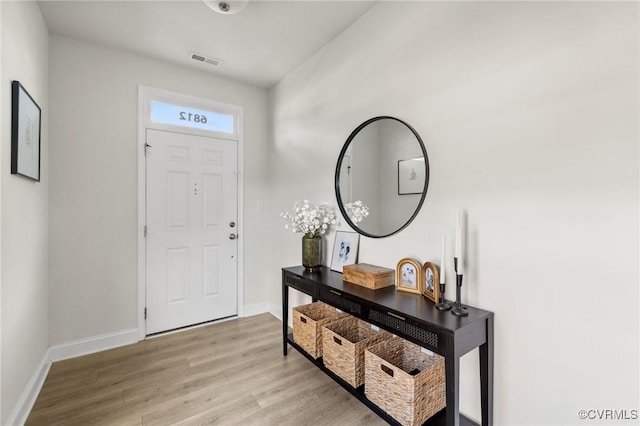 6812 Leire Ln, Chesterfield, VA 23832 - foyer entrance featuring light wood-style floors and baseboards
