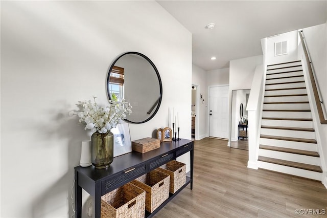 6812 Leire Ln, Chesterfield, VA 23832 - hallway with stairs, light wood-style floors, recessed lighting, and baseboards