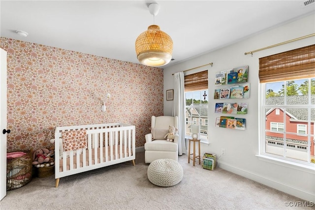 6812 Leire Ln, Chesterfield, VA 23832 - carpeted bedroom featuring baseboards, wallpapered walls, and a crib