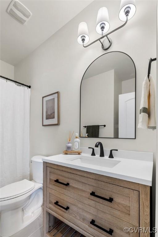 6812 Leire Ln, Chesterfield, VA 23832 - bathroom featuring vanity, toilet, and a shower with curtain