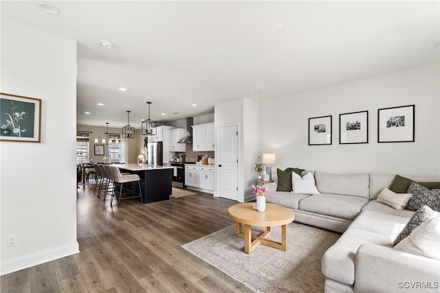 6812 Leire Ln, Chesterfield, VA 23832 - living room featuring dark wood-type flooring, recessed lighting, and baseboards