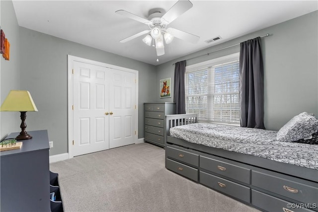 8500 Baldwin Creek Rd, Chesterfield, VA 23832 - bedroom with ceiling fan, light colored carpet, baseboards, visible vents, and a closet