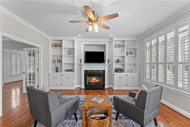 8500 Baldwin Creek Rd, Chesterfield, VA 23832 - living area featuring a high end fireplace, plenty of natural light, and wood finished floors