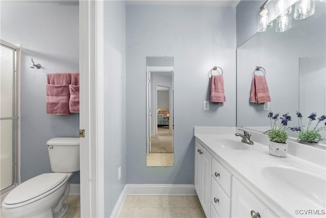 8500 Baldwin Creek Rd, Chesterfield, VA 23832 - bathroom with a sink, toilet, double vanity, baseboards, and a stall shower
