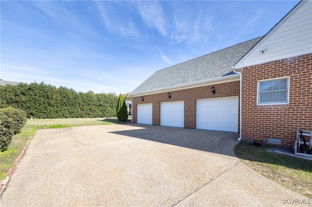 4900 Wellington Farms Dr, Chester, VA 23831 - view of side of property featuring brick siding, driveway, a shingled roof, and a garage