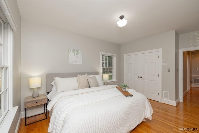 4900 Wellington Farms Dr, Chester, VA 23831 - bedroom featuring a closet and light wood-type flooring