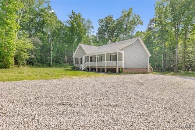 ranch-style home with a porch, stairway, and crawl space