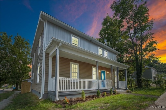 traditional-style home with covered porch