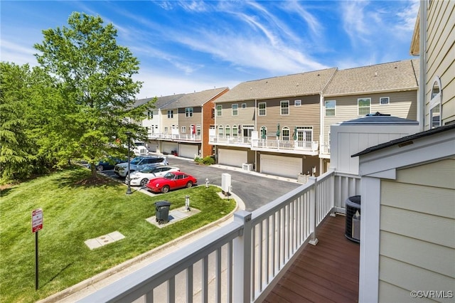 3702 Maher Mnr, Glen Allen, VA 23060 - wooden terrace featuring a residential view, driveway, central air condition unit, a yard, and an attached garage