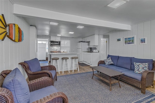living area featuring light wood-type flooring