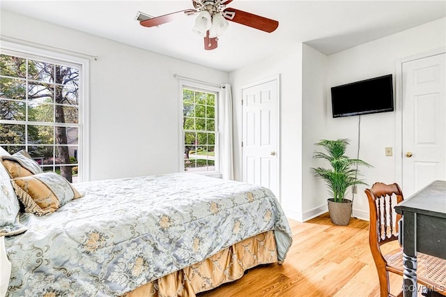 10278 Henderson Hall Rd, Mechanicsville, VA 23116 - bedroom featuring ceiling fan, baseboards, visible vents, and light wood-type flooring