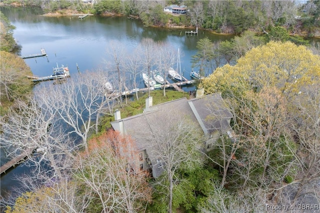 exterior space with a water view