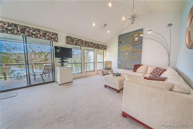 carpeted living room featuring a ceiling fan, high vaulted ceiling, and recessed lighting