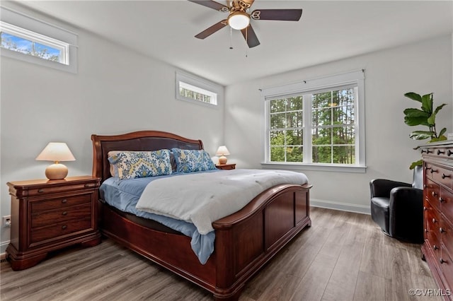 5530 Tyshire Pkwy, Providence Forge, VA 23140 - bedroom with multiple windows, wood finished floors, baseboards, and ceiling fan