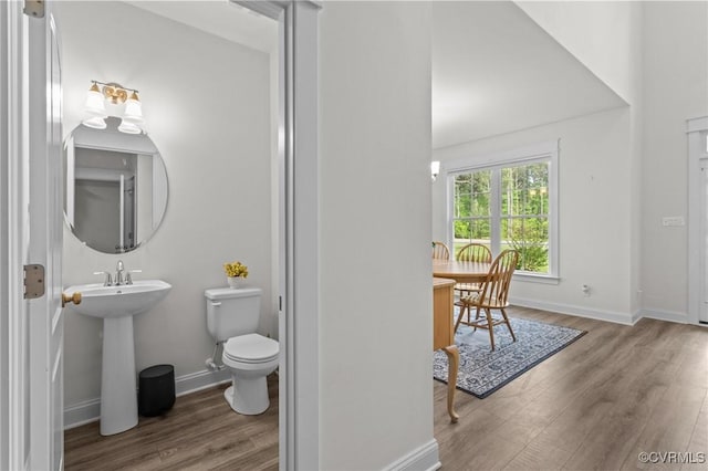 5530 Tyshire Pkwy, Providence Forge, VA 23140 - bathroom with wood finished floors, toilet, and baseboards