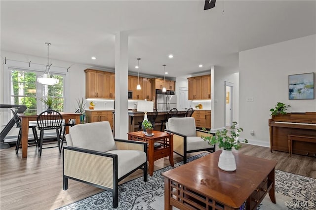 5530 Tyshire Pkwy, Providence Forge, VA 23140 - living room with light wood-style flooring, recessed lighting, a ceiling fan, and baseboards