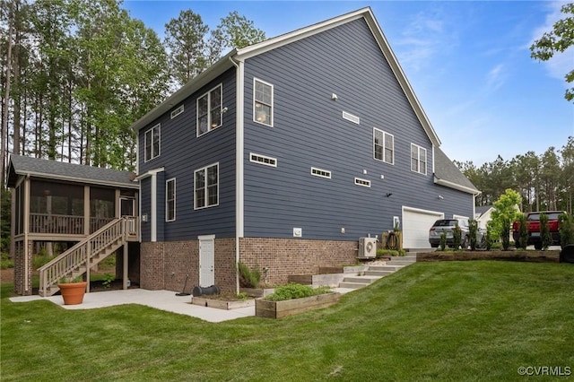 5530 Tyshire Pkwy, Providence Forge, VA 23140 - back of property featuring a sunroom, stairway, brick siding, a patio, and an attached garage