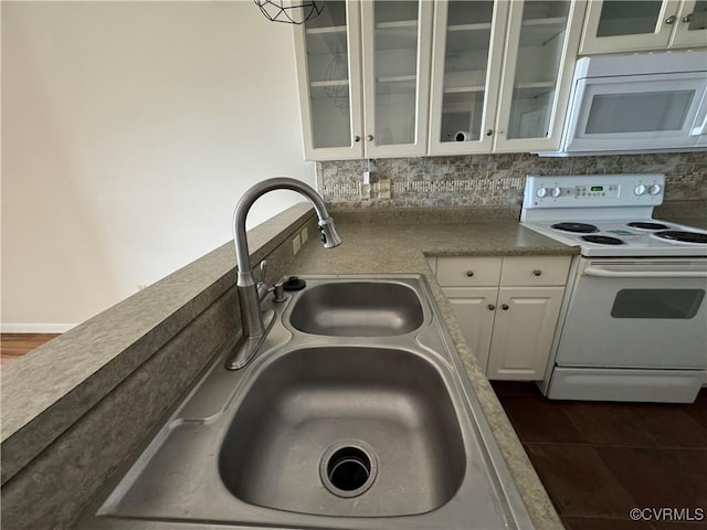301 Beacon Ridge Dr Unit 607, Hopewell, VA 23860 - kitchen with white appliances, a sink, white cabinets, and glass insert cabinets