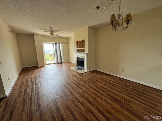 301 Beacon Ridge Dr Unit 607, Hopewell, VA 23860 - unfurnished living room with a chandelier, a textured ceiling, dark wood-type flooring, a fireplace with flush hearth, and baseboards