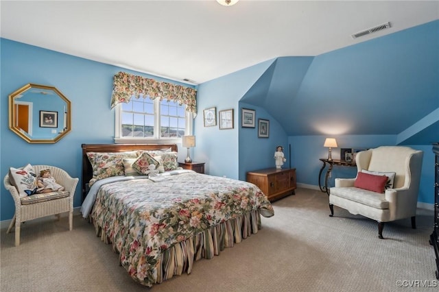 bedroom featuring carpet floors, visible vents, and baseboards