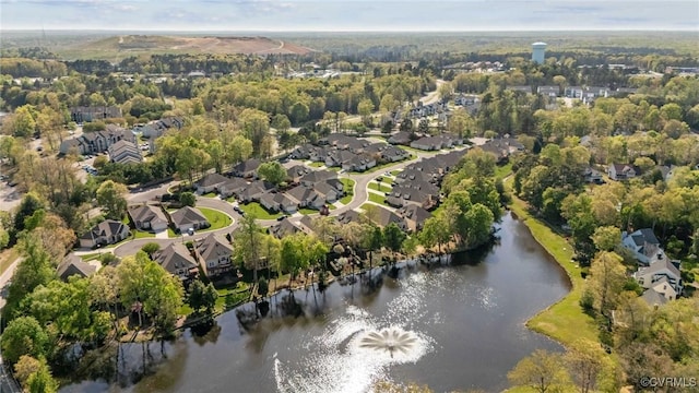 aerial view with a residential view and a water view
