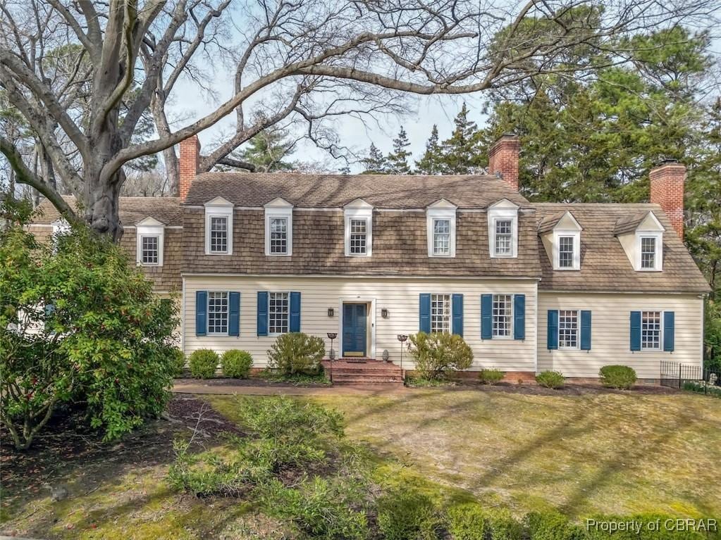 117 Walnut Hills Dr, Williamsburg, VA 23185 - new england style home with a chimney and a front lawn