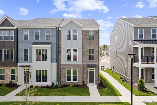 12129 Morning Walk, Henrico, VA 23233 - townhome / multi-family property with brick siding and a front lawn