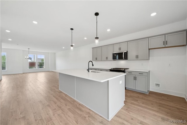 12129 Morning Walk, Henrico, VA 23233 - kitchen with stainless steel appliances, gray cabinets, a sink, light wood-style flooring, and recessed lighting