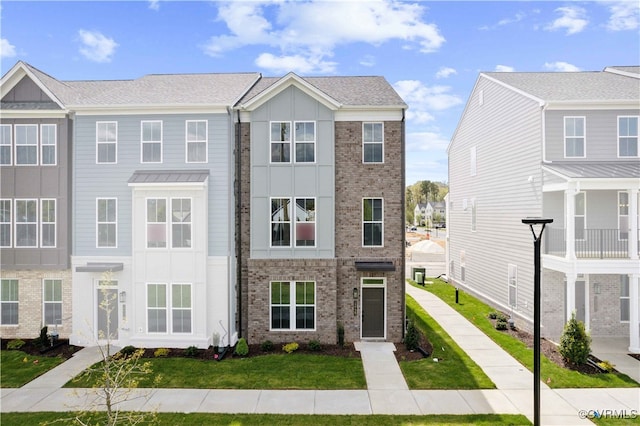 12129 Morning Walk, Henrico, VA 23233 - multi unit property with brick siding and a front lawn