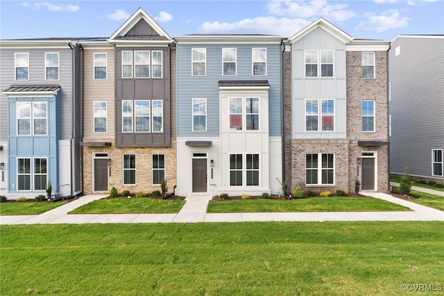 12127 Morning Walk, Henrico, VA 23233 - view of property with a front lawn and brick siding