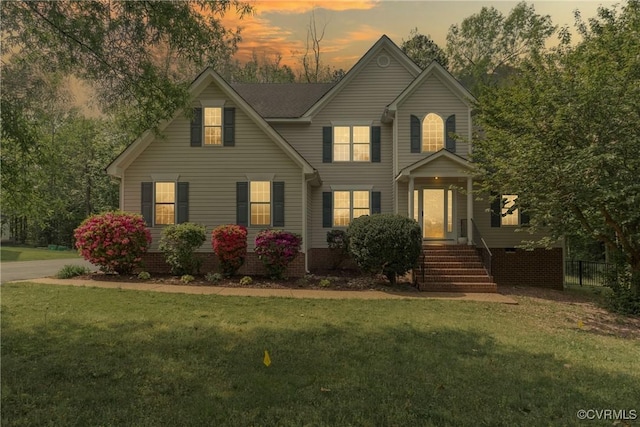 traditional-style home with a yard