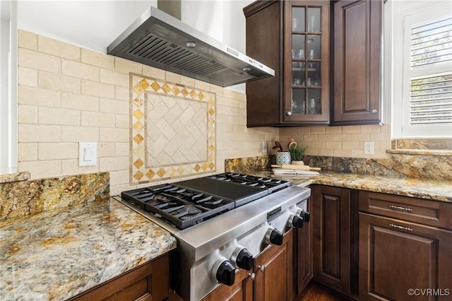 1300 Baltrey Ln, Midlothian, VA 23112 - kitchen with wall chimney exhaust hood, stainless steel gas cooktop, light stone counters, and backsplash