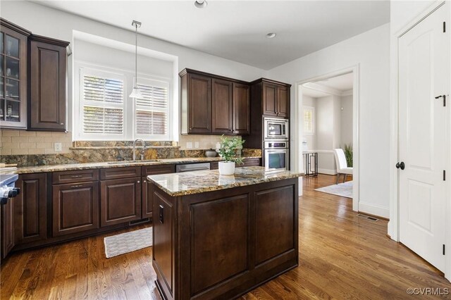 1300 Baltrey Ln, Midlothian, VA 23112 - kitchen with stainless steel appliances, a sink, dark wood finished floors, backsplash, and recessed lighting