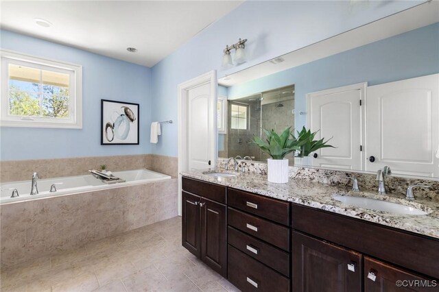 1300 Baltrey Ln, Midlothian, VA 23112 - full bath with a stall shower, a garden tub, double vanity, and tile patterned flooring