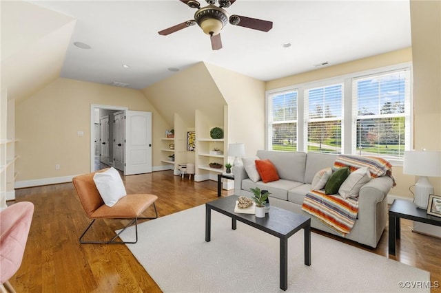1300 Baltrey Ln, Midlothian, VA 23112 - living area featuring vaulted ceiling, wood finished floors, a ceiling fan, and baseboards